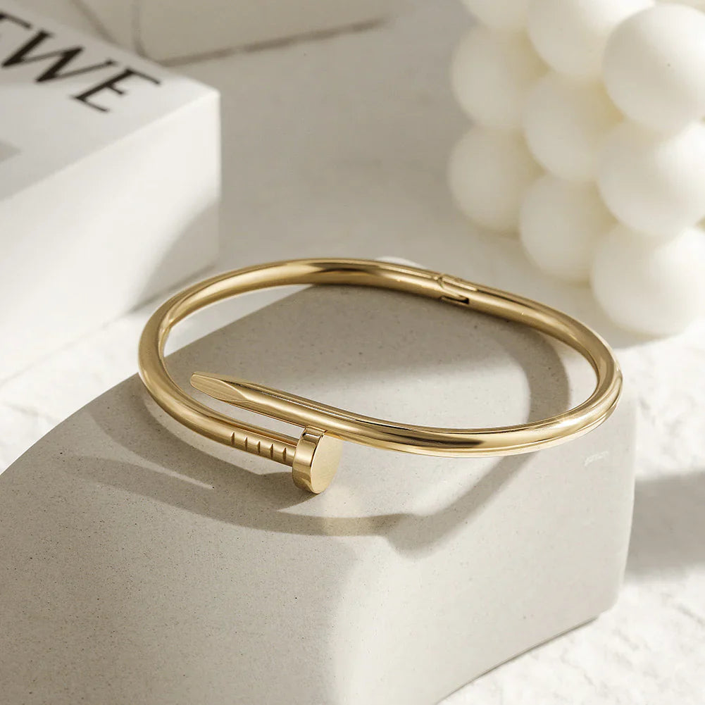 Buy Gold Screw Nail Bangle Bracelet For Men and Women in Pakistan.