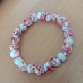 Buy Red Flower Agate Stone Bracelet For Men and Women in Pakistan.