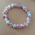 Buy Red Flower Agate Stone Bracelet For Men and Women in Pakistan.